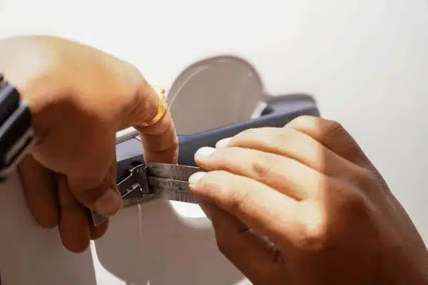 emergency locksmith, Locks R Us Locksmith, locksmith locksmith using a tool to open door handle, emergency locksmith, Locks R Us Locksmith, locksmith