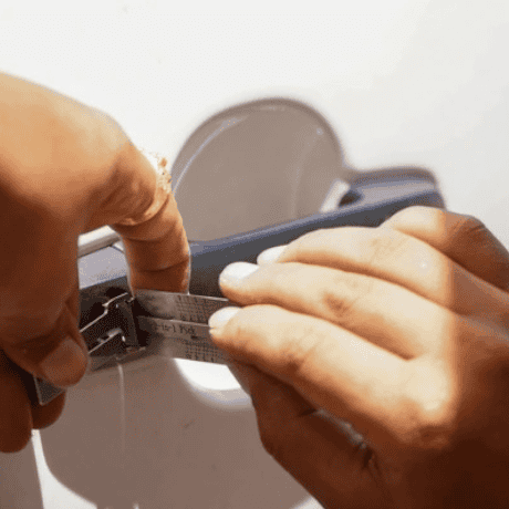 emergency locksmith, Locks R Us Locksmith, locksmith locksmith using a tool to open door handle, emergency locksmith, Locks R Us Locksmith, locksmith